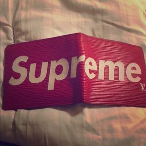 Red Supreme Louis Vuitton Wallet. Never been used.